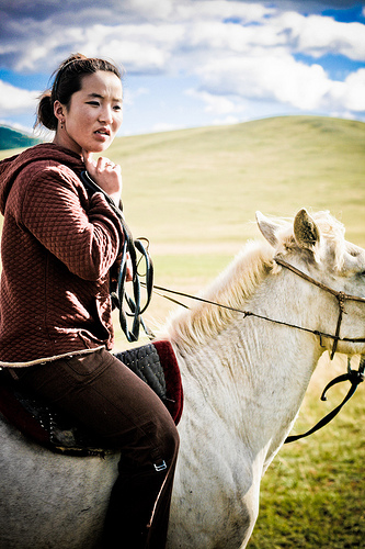 mongolian girl on horse photo